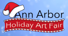 Holiday Art Fair logo with Santa hat