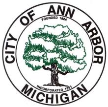 Image of a tree in the middle of a circle reading "City of Ann Arbor Michigan"