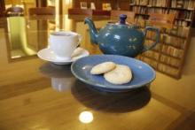 Photograph of tea and biscuits.