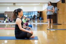 Photograph of a Group-X Yoga class in session.