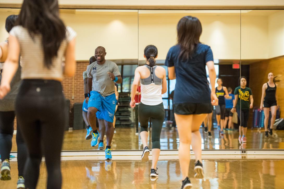 Photograph of students exercising during a Zumba class.