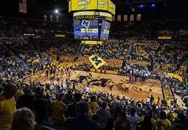 Photograph of a basketball game in Crisler Center.