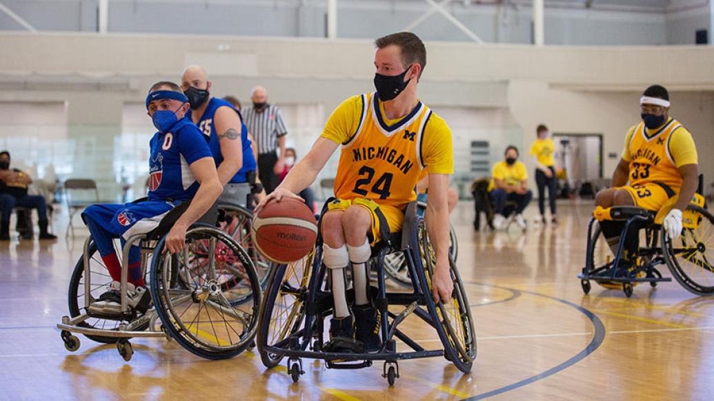 Photograph of a wheelchair basketball game in action!