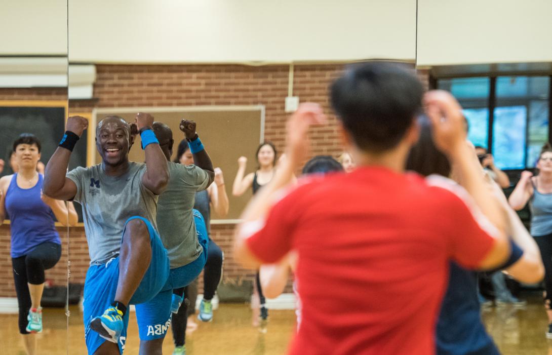 Photograph of people exercising.