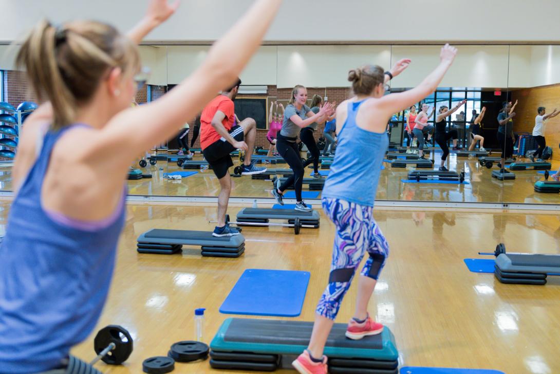 Photograph of a Group-X Strength Class in session.