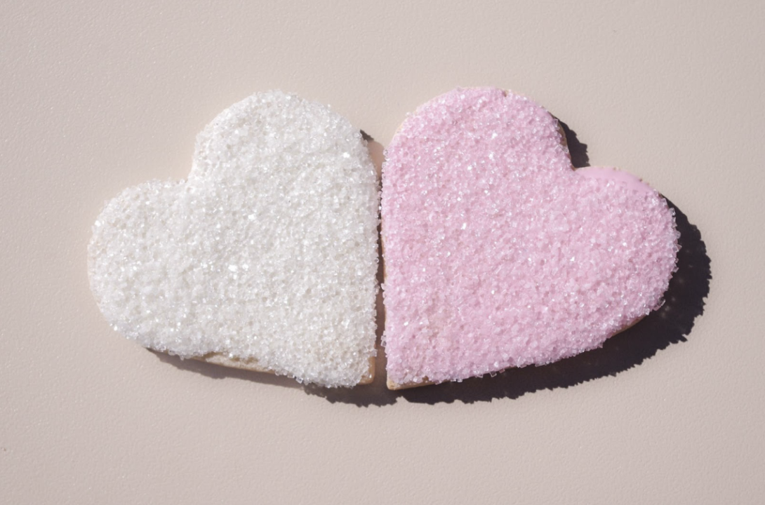 Photograph of two heart shaped cookies.