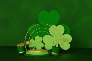 Image of shamrocks, a rainbow, and green hats.